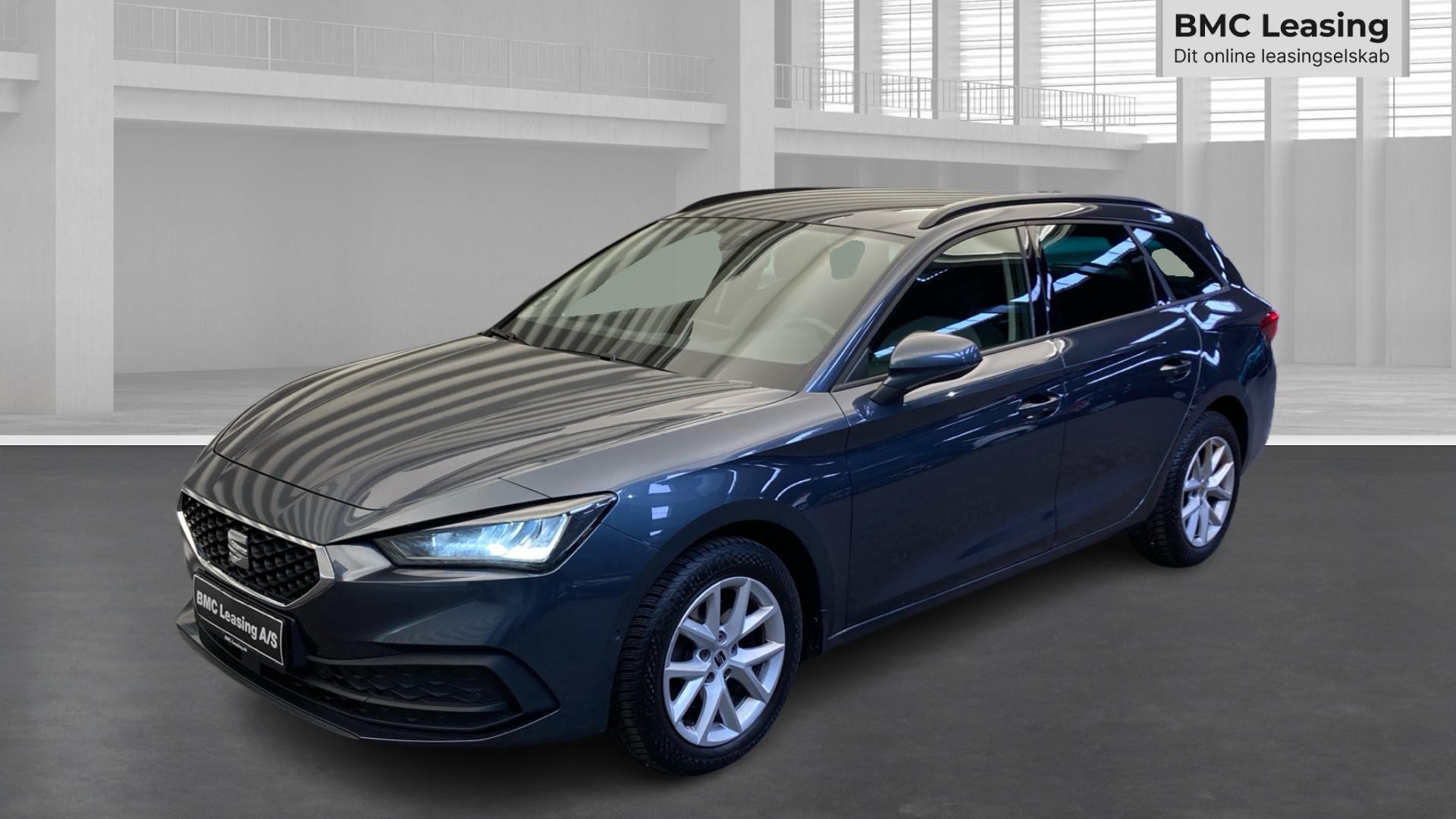 001 k26-06 909018 SEAT Leon Style 1.5 TSI EVO st.car - Skråt forfra, venstre