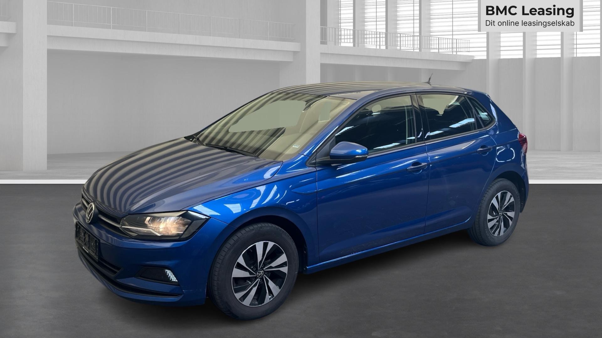 001 u26-05 908266 VW Polo Advance TSI DSG - Skråt forfra, venstre