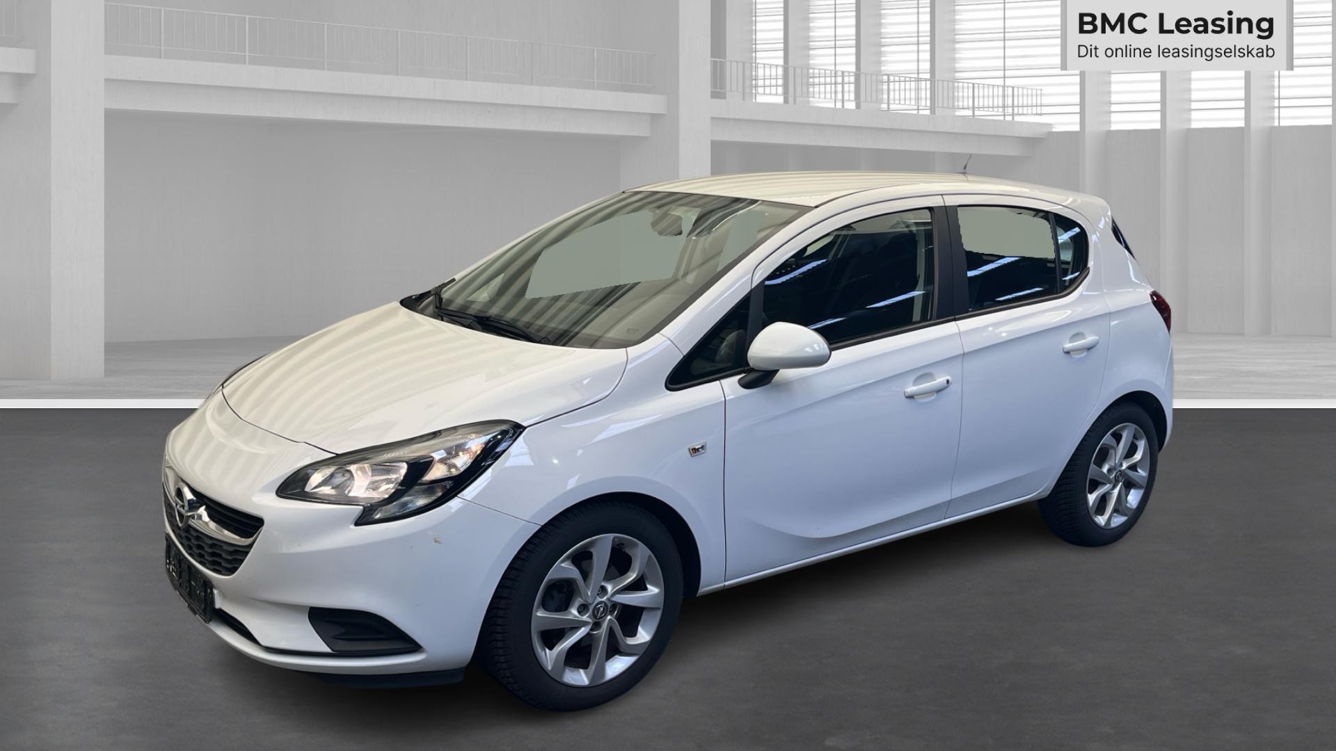 001 u26-06 907122 Opel Corsa Enjoy Plus 1.4i aut. 5-dr - Skråt forfra, venstre