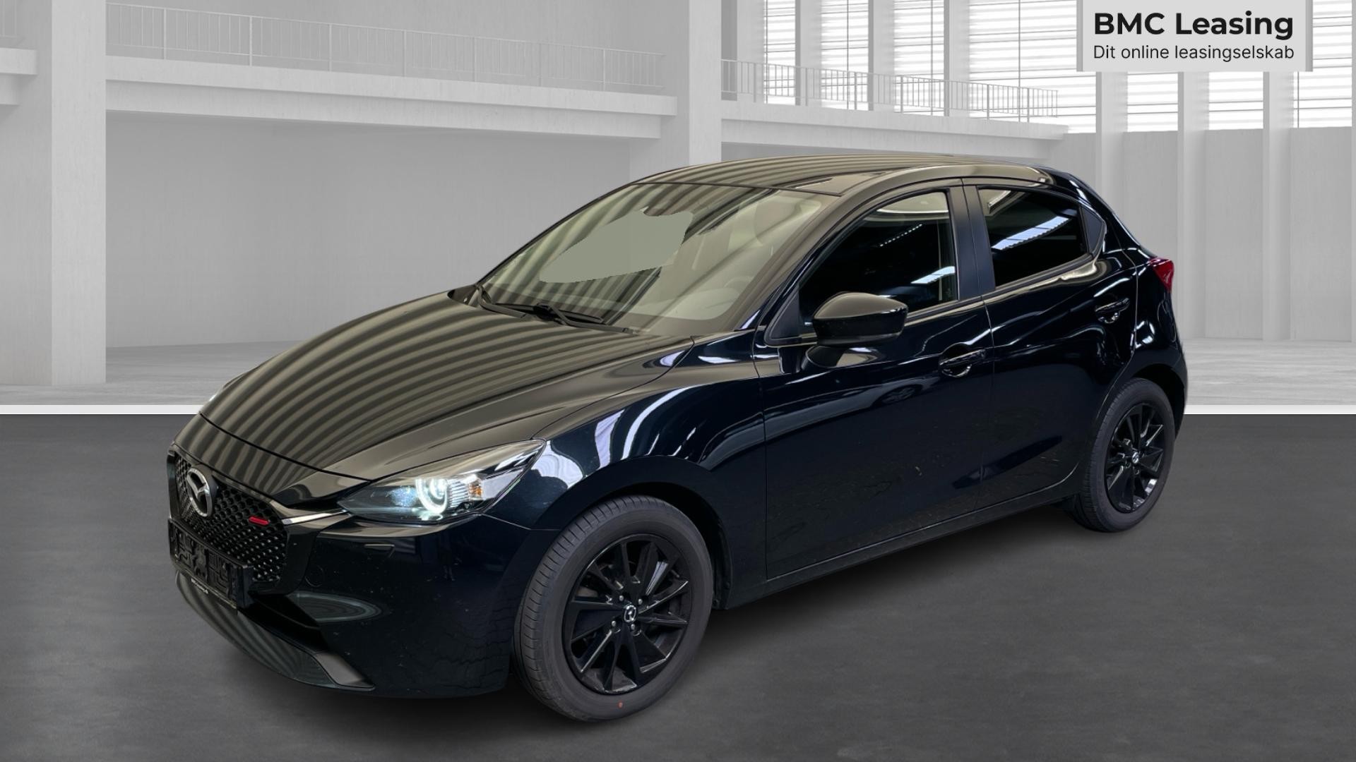 001 u26-06 908723 Mazda2 Homura SkyActiv-G aut. - Skråt forfra, venstre