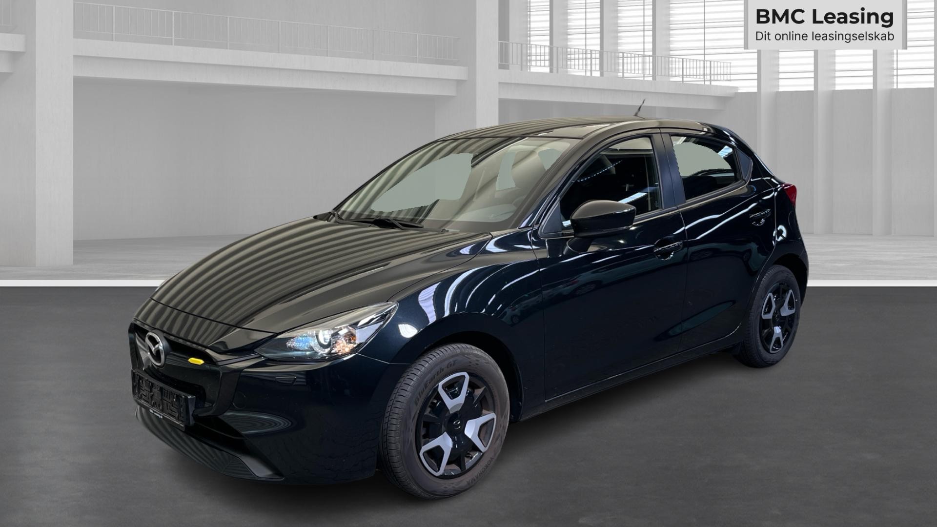 001 u26-06 909365 Mazda2 Centre-Line SkyActiv-G aut. - Skråt forfra, venstre