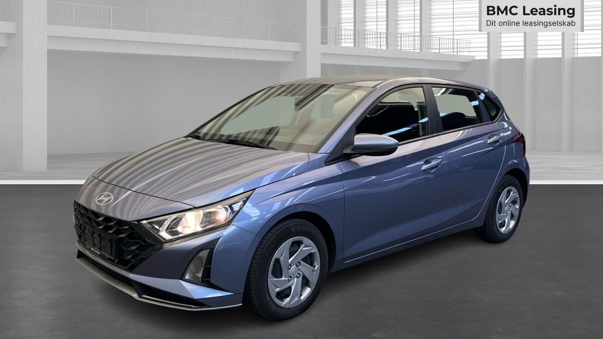 001 u26-06 910206 Hyundai i20 Essential T-GDi aut. - Skråt forfra, venstre