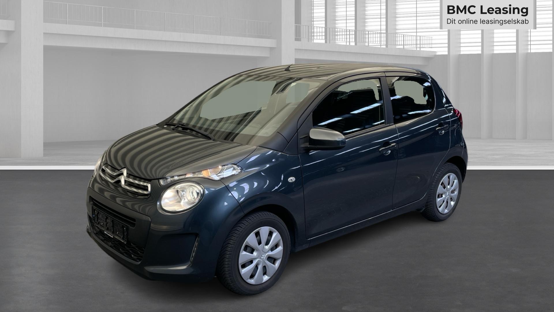 001 u26-06 911202 Citroën C1 Attaque VTi - Skråt forfra, venstre