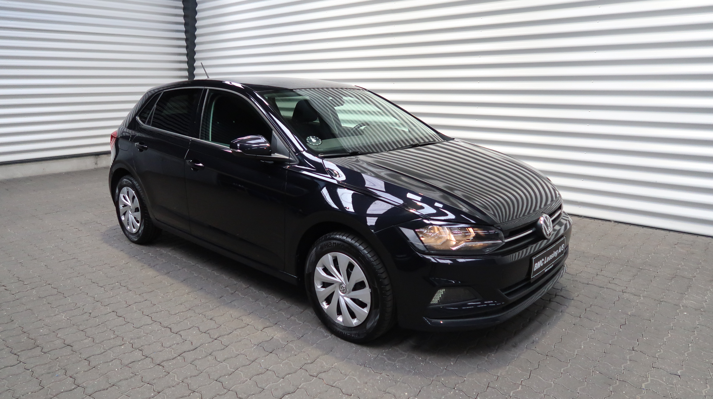 001 k22-06 907190 VW Polo Comfortline TSI - Skråt forfra, højre