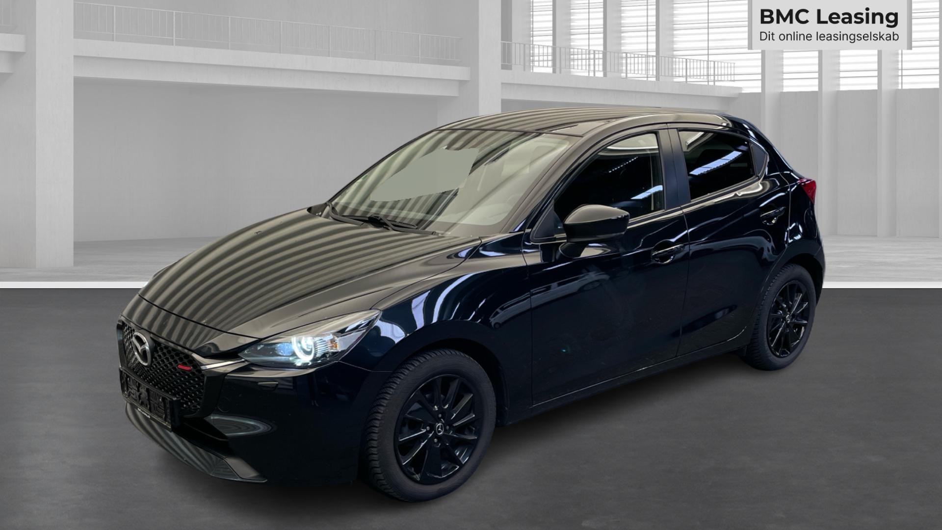 001 u26-07 909005 Mazda2 Homura SkyActiv-G aut. - Skråt forfra, venstre