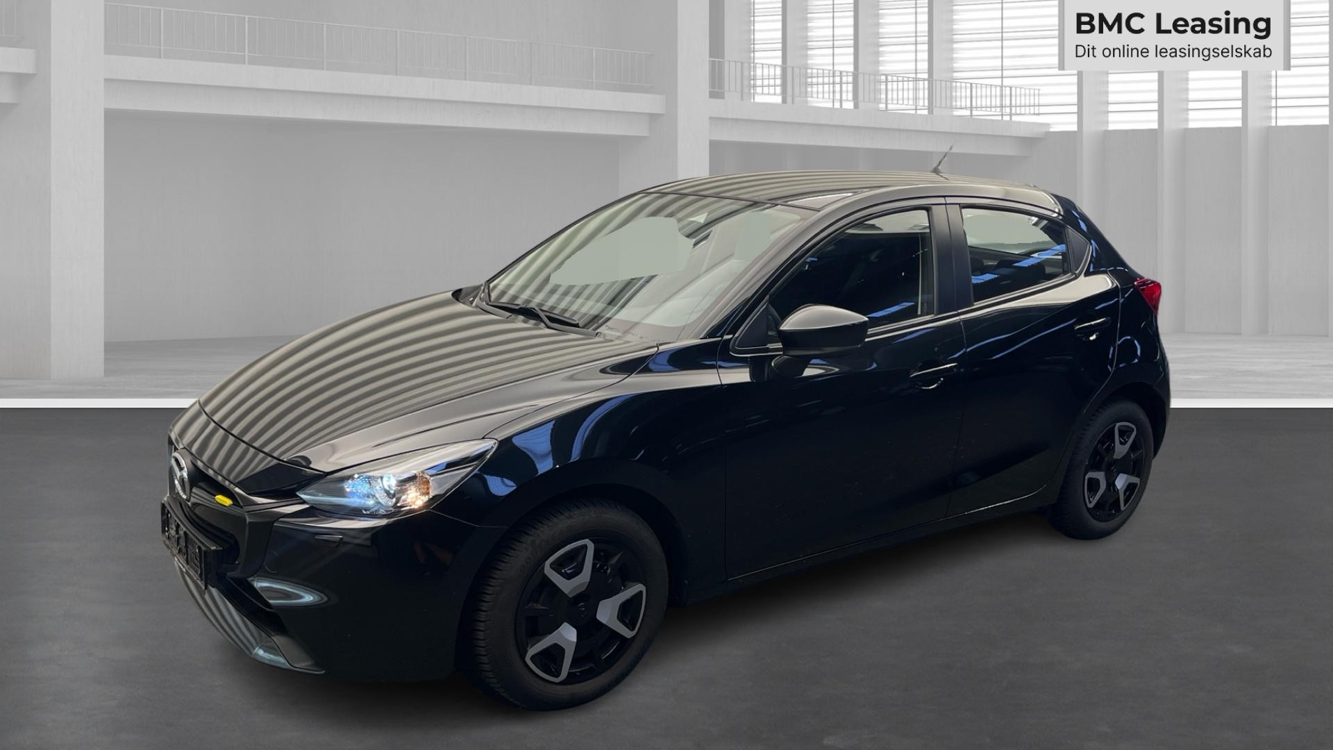 001 909441 u26-08 Mazda 2, Skråt forfra venstre
