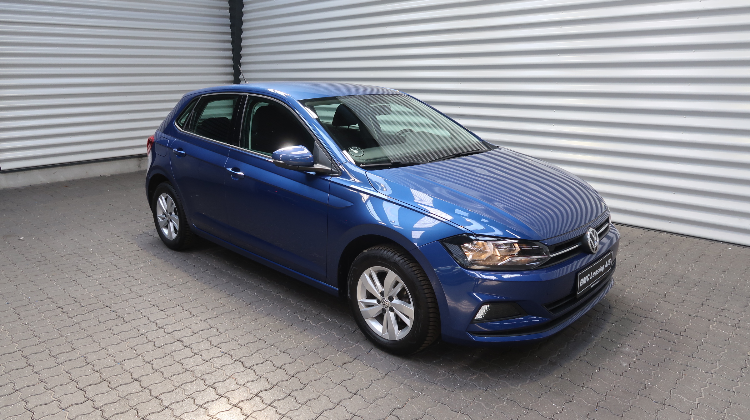 001 k23-05 905278 VW Polo Advance TSI DSG - Skråt forfra, højre