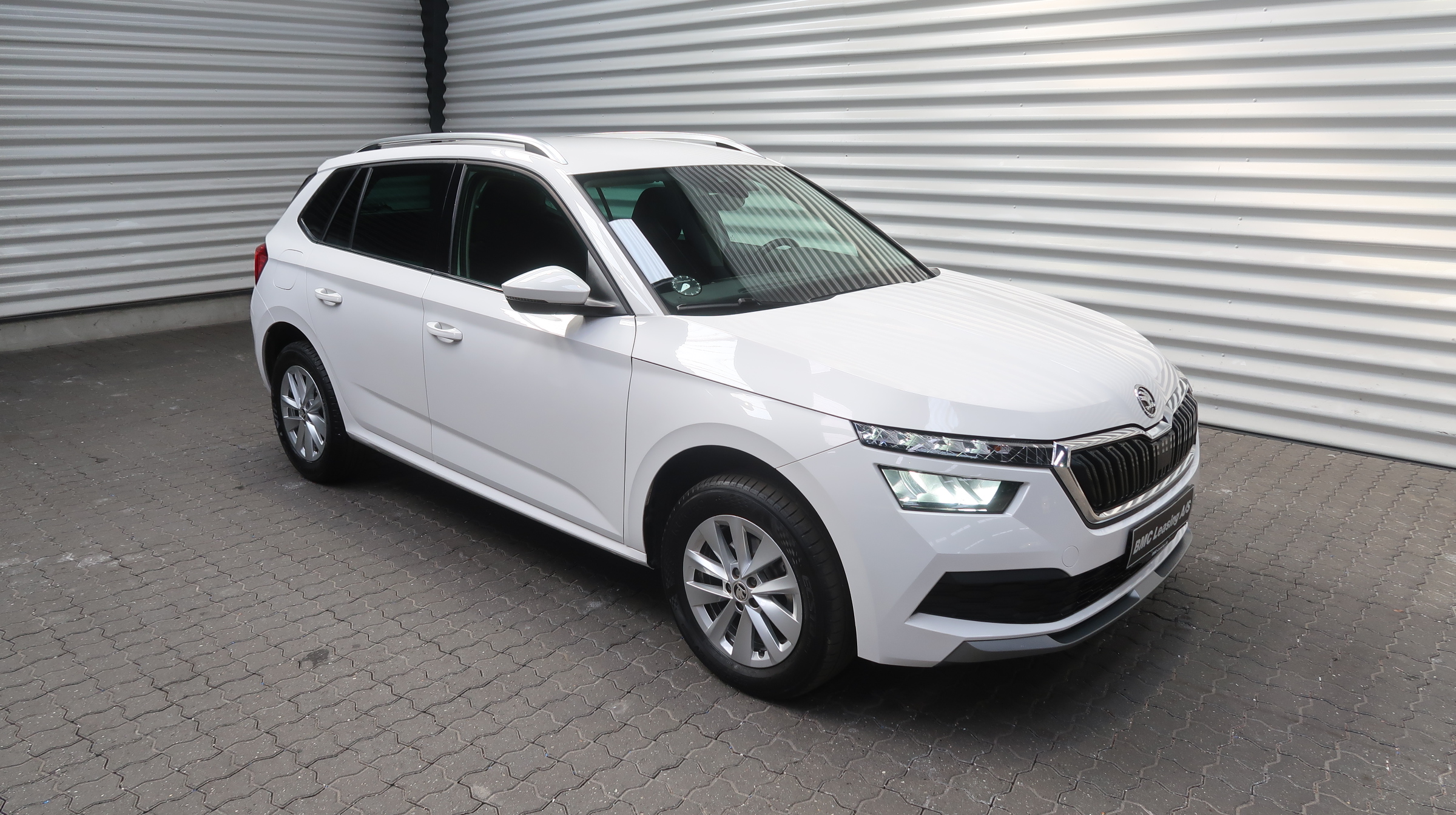 001 k25-03 910346 Škoda Kamiq Ambition TSI DSG - Skråt forfra, højre