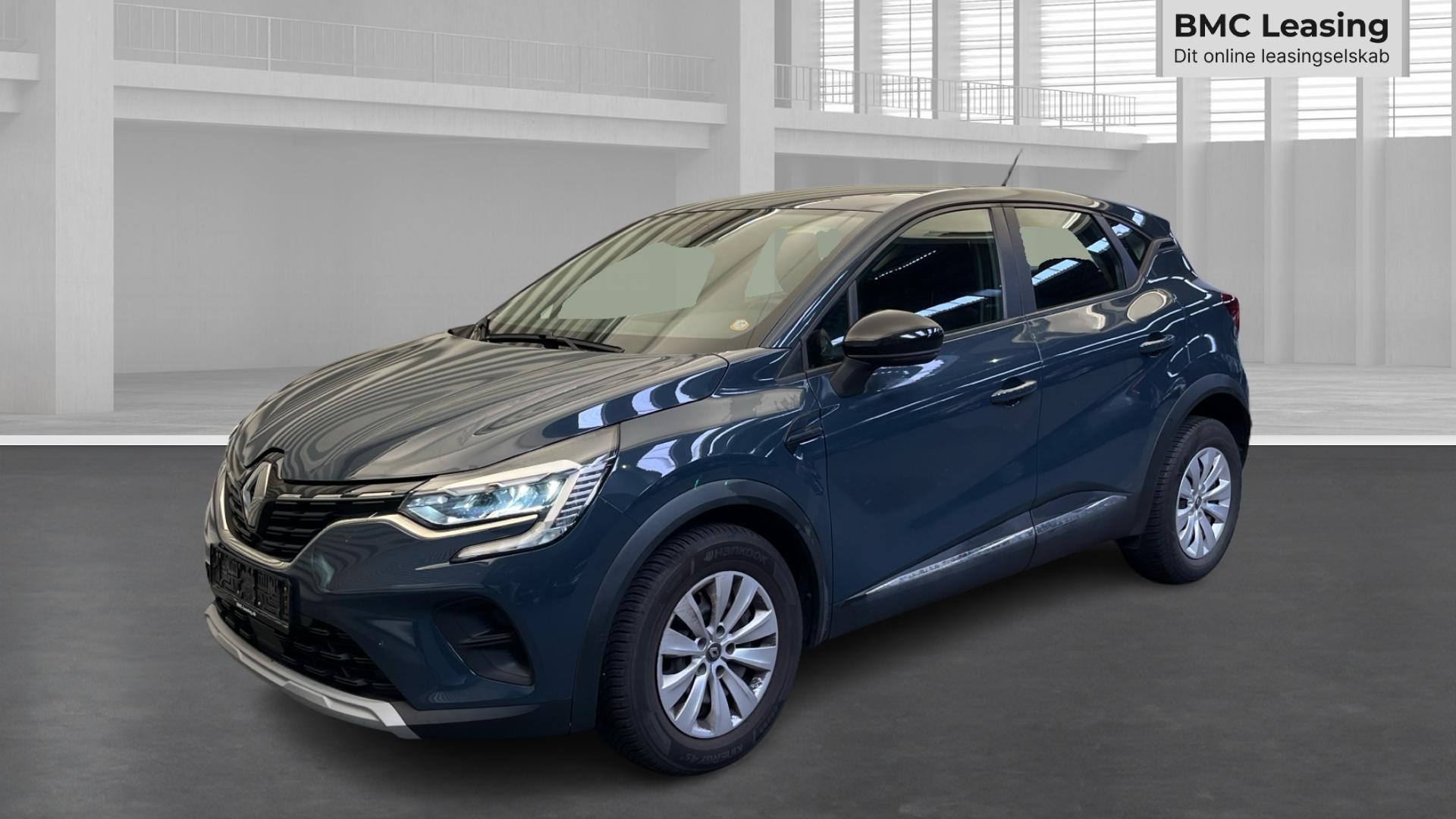 001 u26-08 905712 Renault Captur Zen TCe 100 - Skråt forfra, venstre