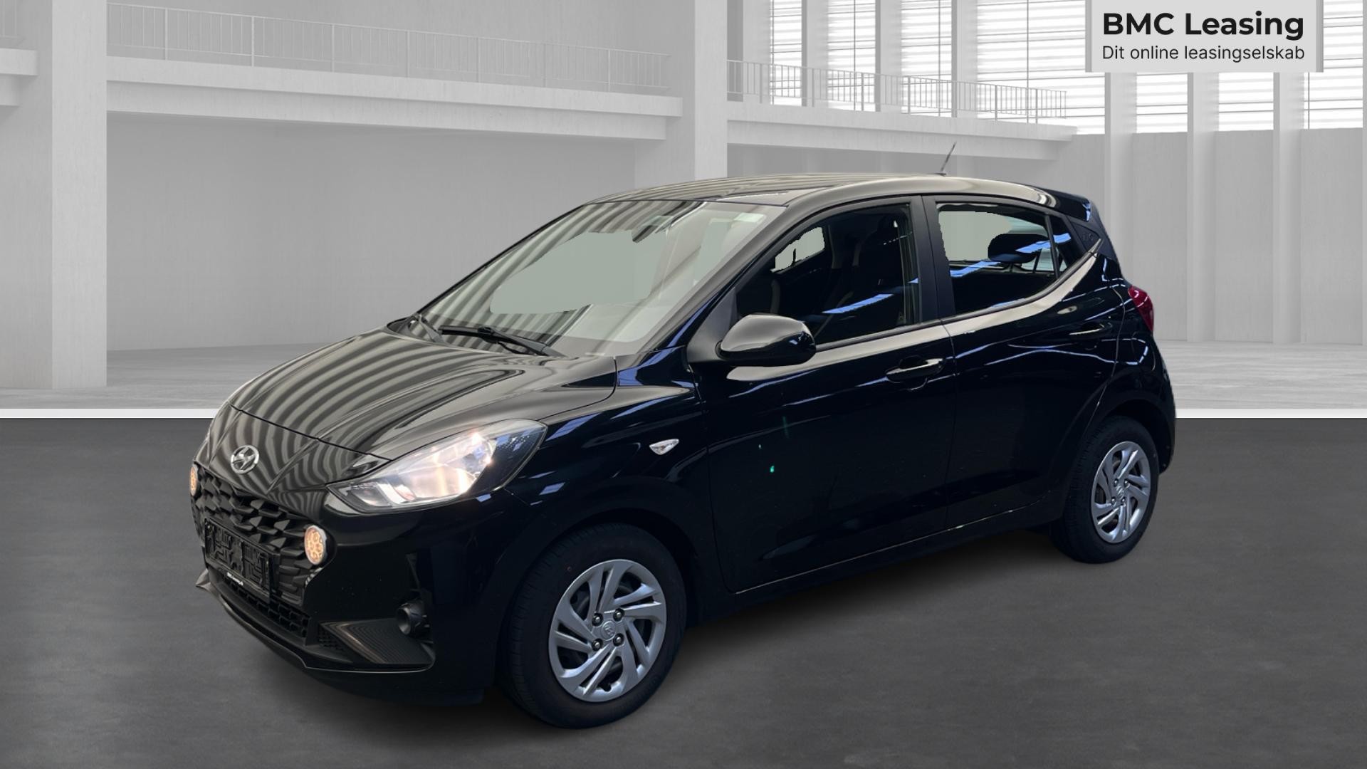 001 u26-09 906526 Hyundai i10 Advanced MPi - Skråt forfra, venstre