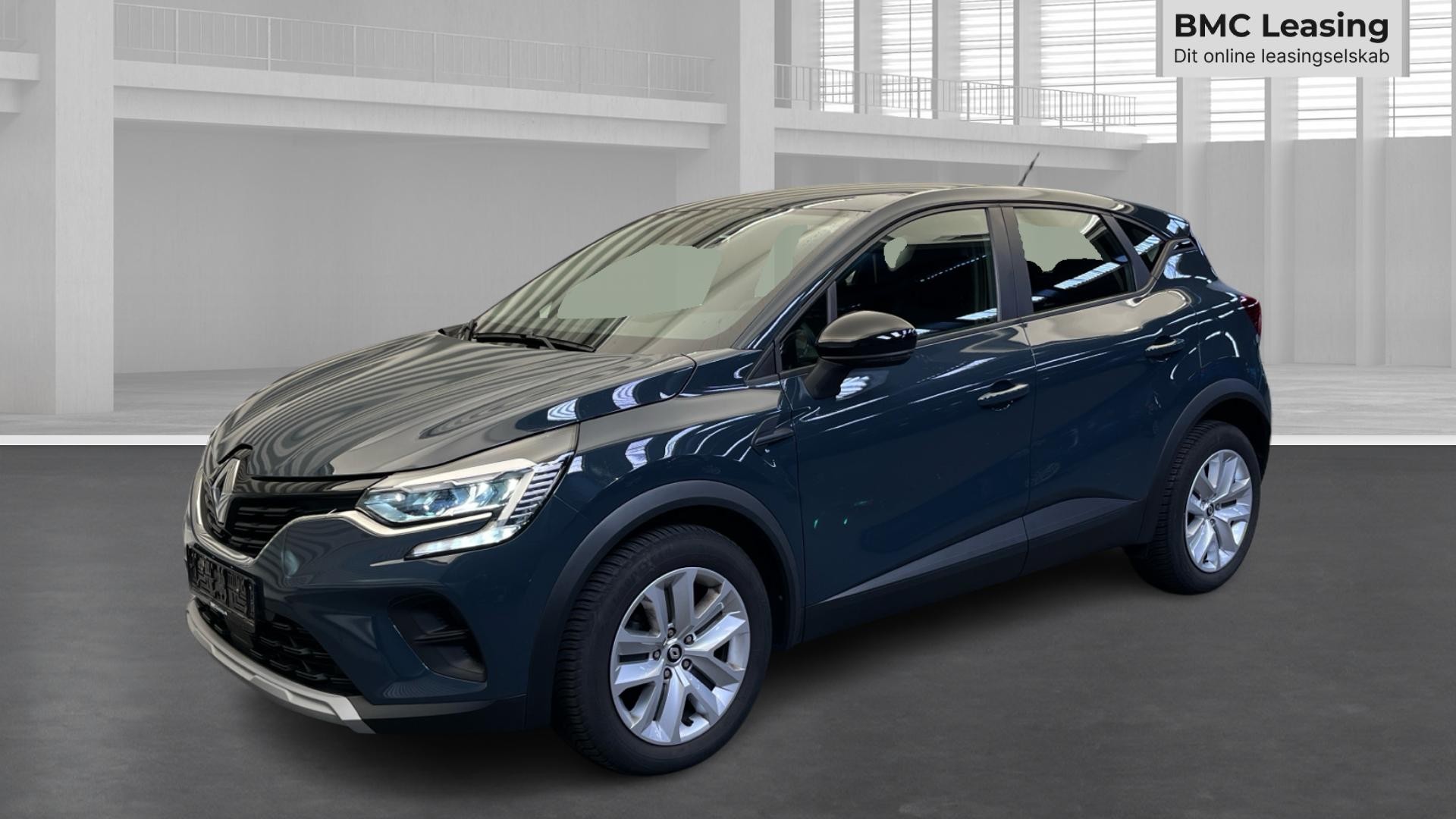 001 u26-09 907558 Renault Captur Zen TCe 90 - Skråt forfra, venstre