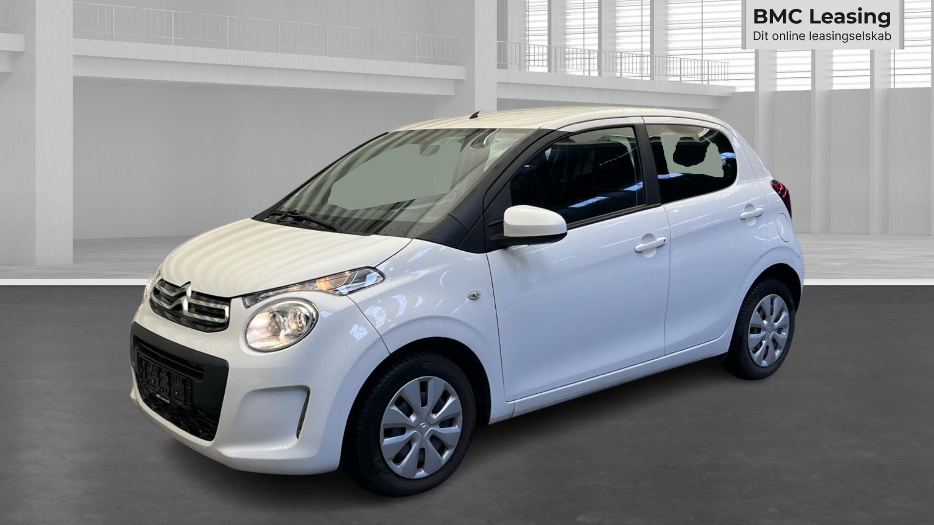 001 u26-09 910079 Citroën C1 Triumph VTi - Skråt forfra, venstre