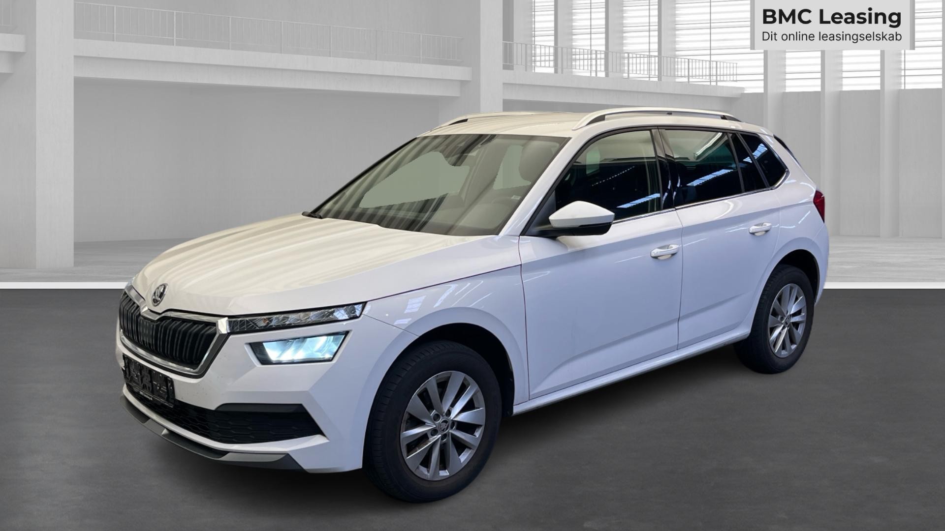 001 u26-09 911049 Škoda Kamiq Ambition TSI DSG - Skråt forfra, venstre