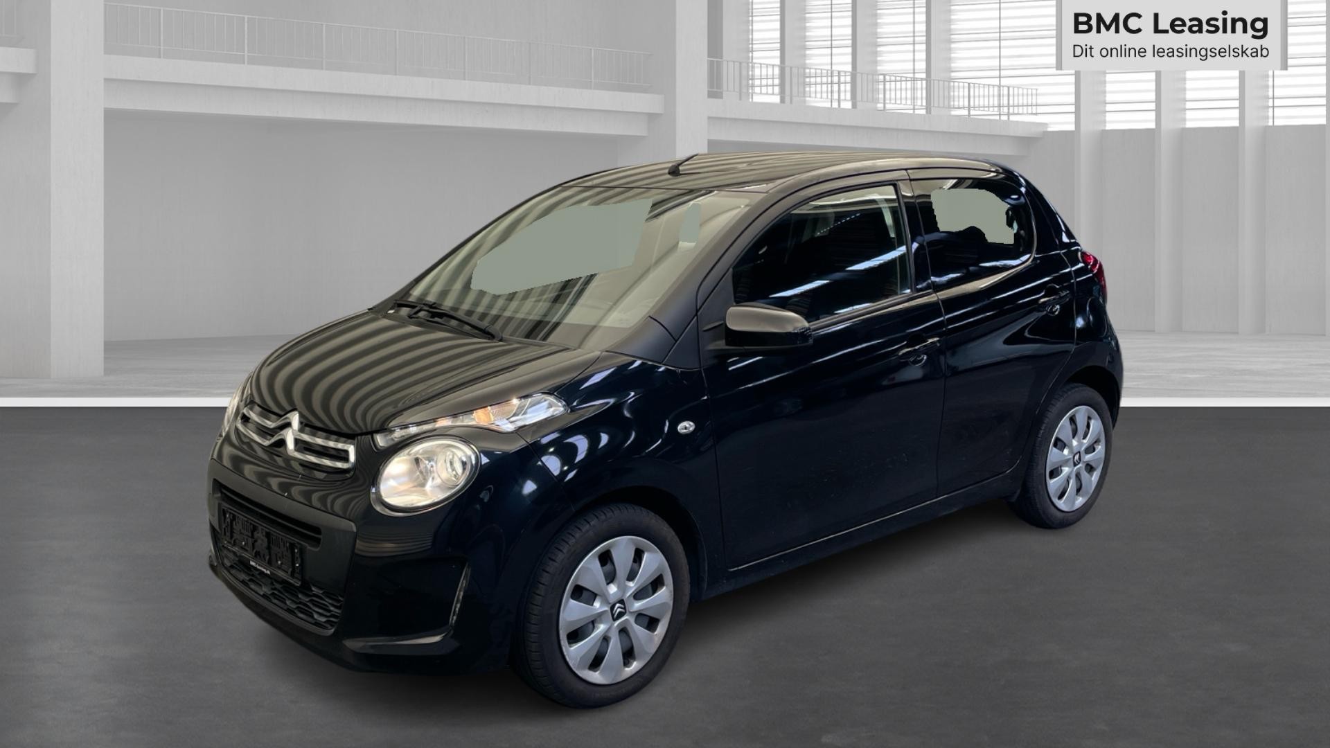 001 u26-09 911379 Citroën C1 Le Mans VTi - Skråt forfra, venstre
