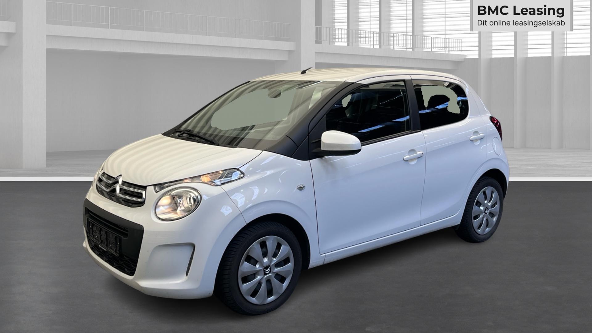 001 u26-09 911726 Citroën C1 Shine VTi - Skråt forfra, venstre