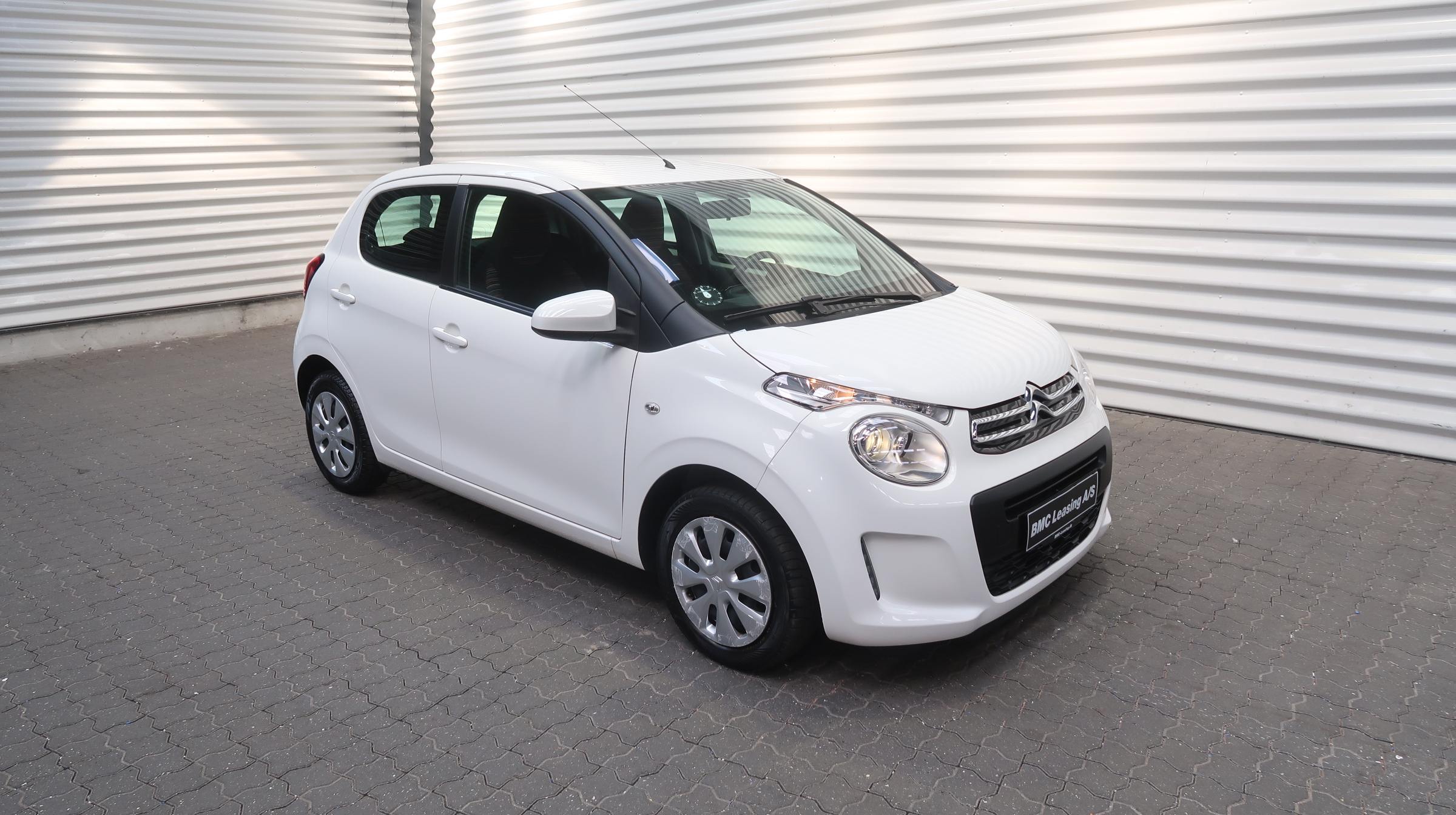 001 k25-06 907115 Citroën C1 Attaque VTi - Skråt forfra, højre