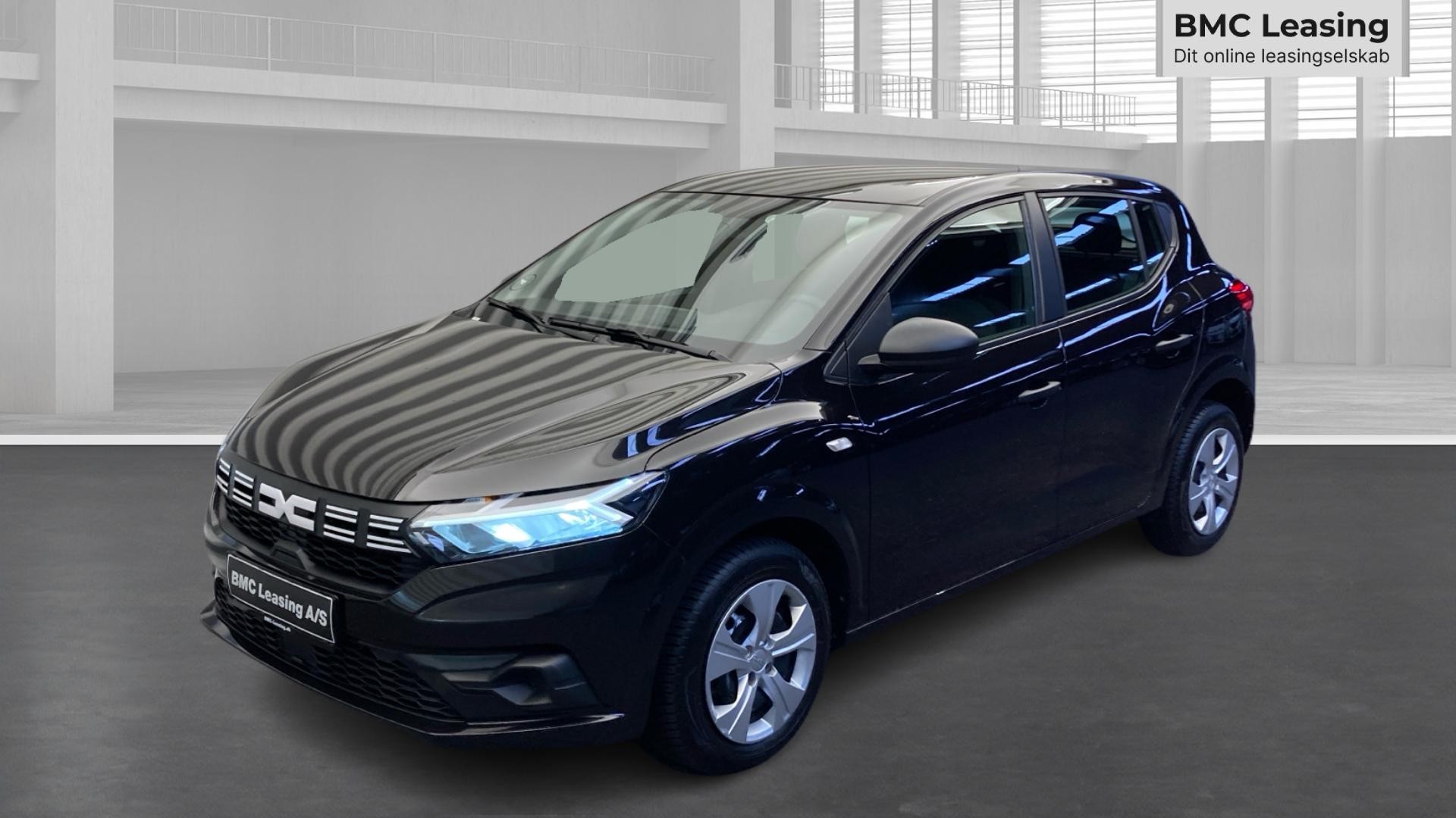 001 k26-10 909307 Dacia Sandero Essential TCe 90 - Skråt forfra, venstre