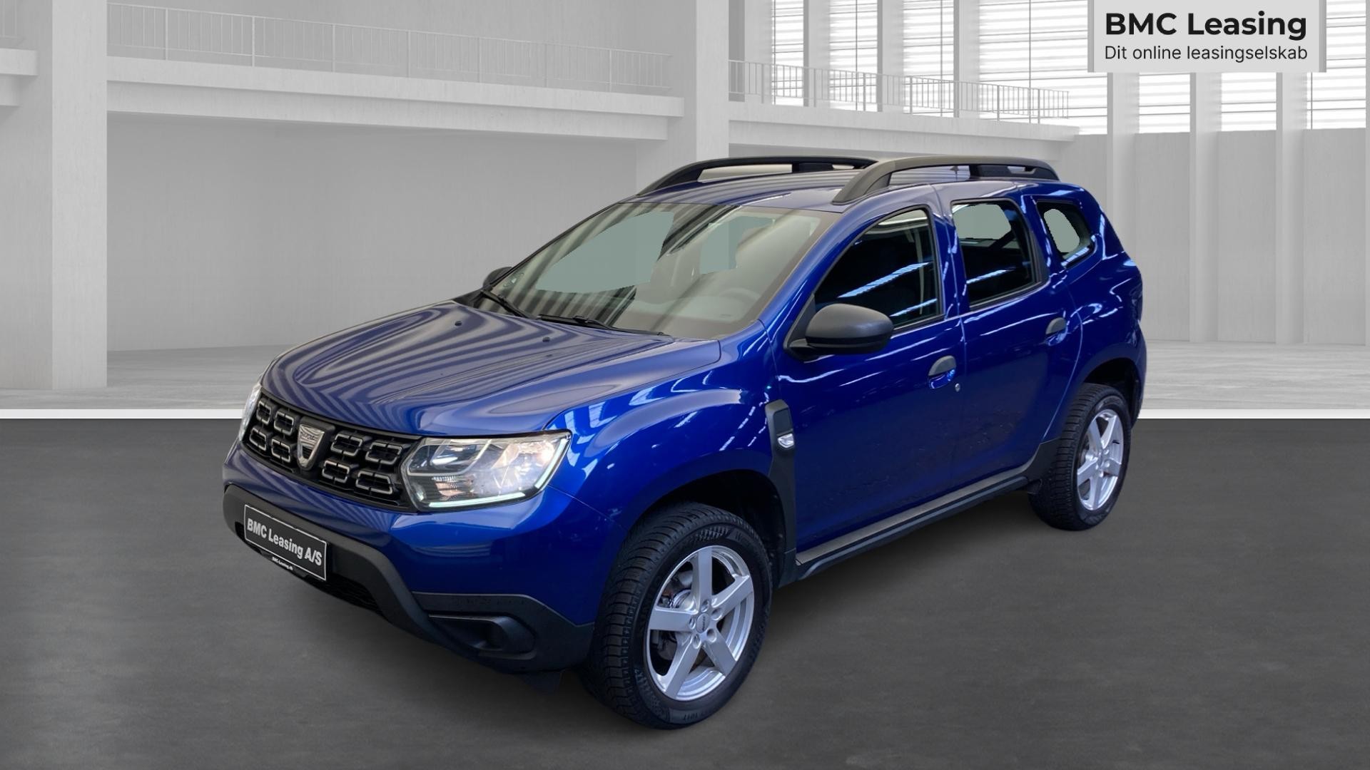 001 k26-10 910534 Dacia Duster Drive Edition TCe 4x2 - Skråt forfra, venstre