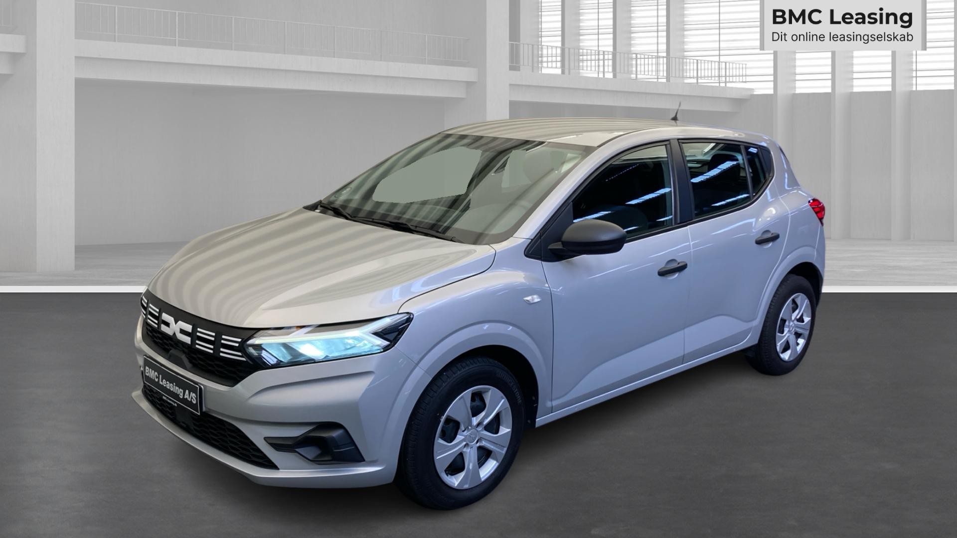 001 k26-10 912362 Dacia Sandero Essential TCe 90 - Skråt forfra, venstre