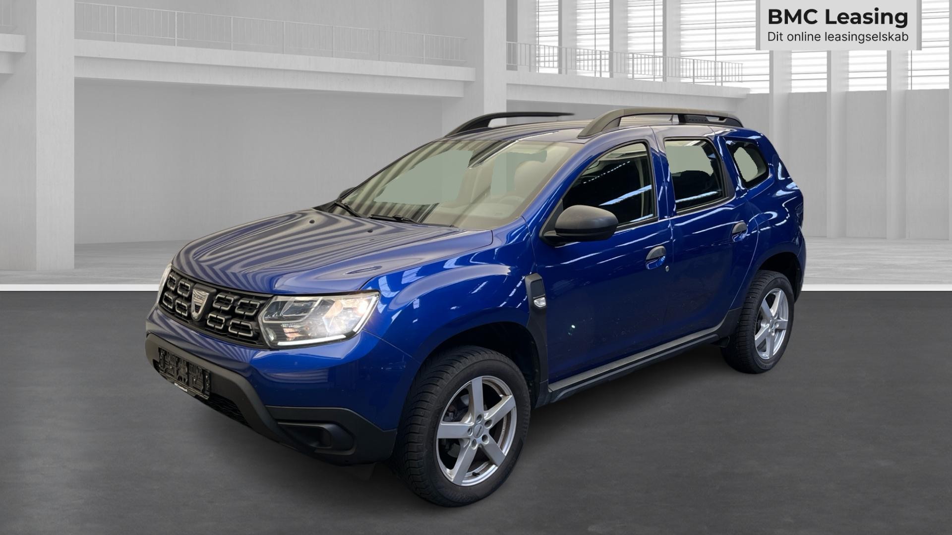 001 u26-10 910534 Dacia Duster Drive Edition TCe 4x2 - Skråt forfra, venstre