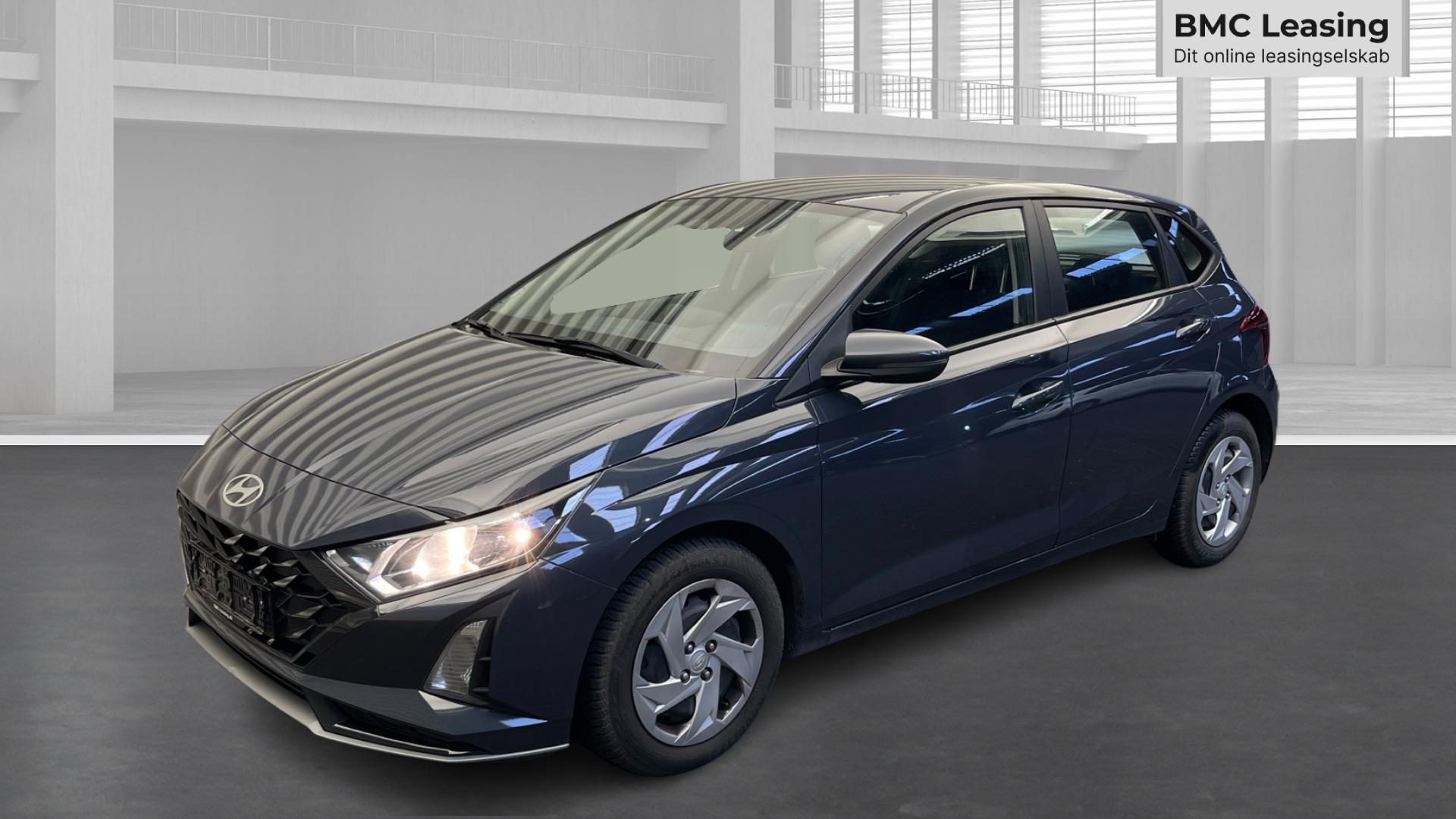 001 u26-10 911279 Hyundai i20 Essential T-GDi aut. - Skråt forfra, venstre