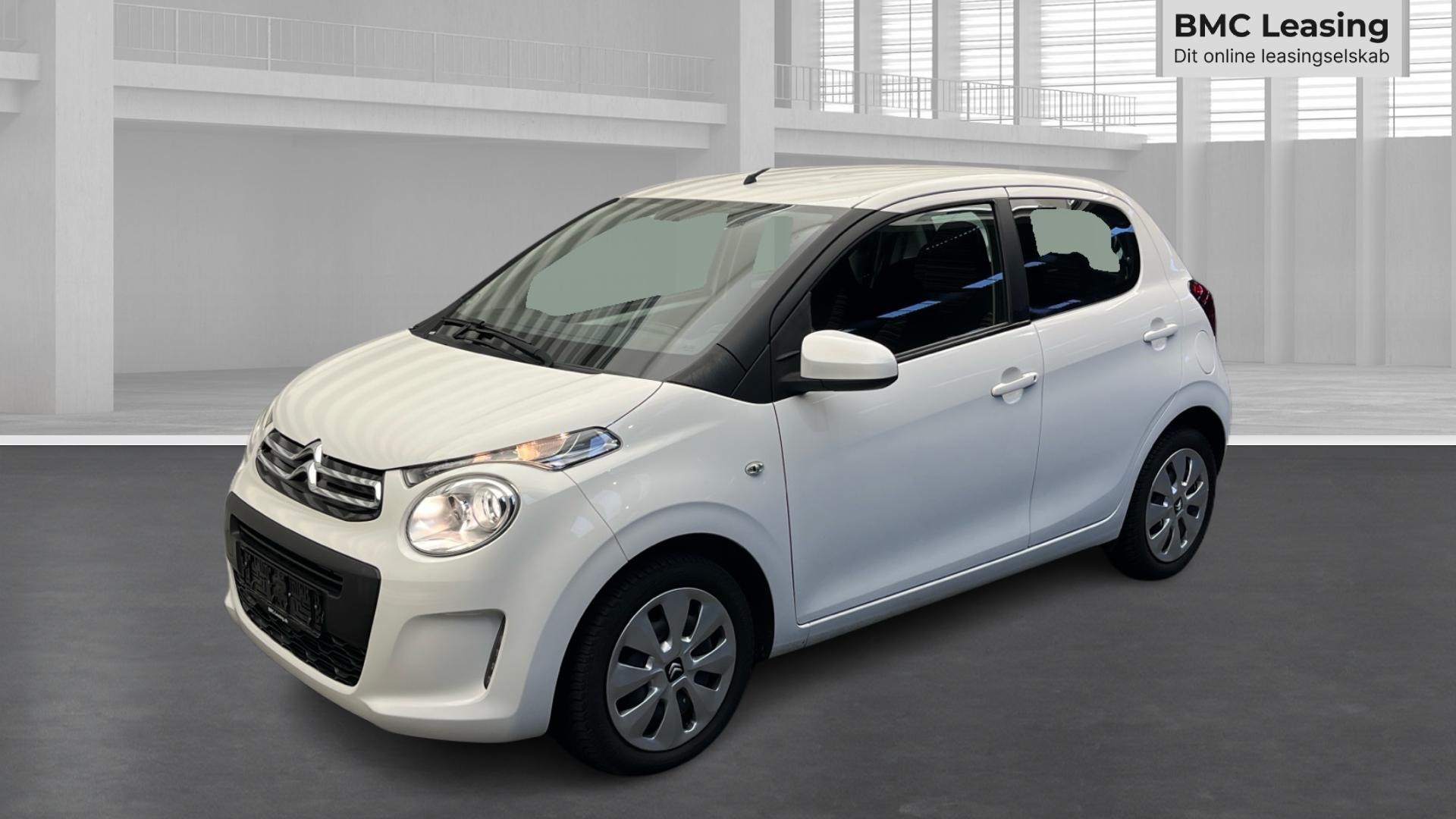 001 u26-10 911552 Citroën C1 Shine VTi - Skråt forfra, venstre